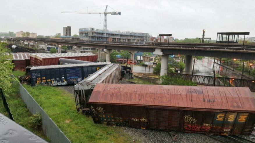 Several cars remain overturned after a CSX freight train derailed in Washington