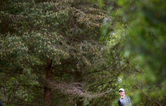 Mc Ilroy watches the flight of his shot on the 11th hole during day four of the Irish Open at The K Club Straffan Ireland Sunday