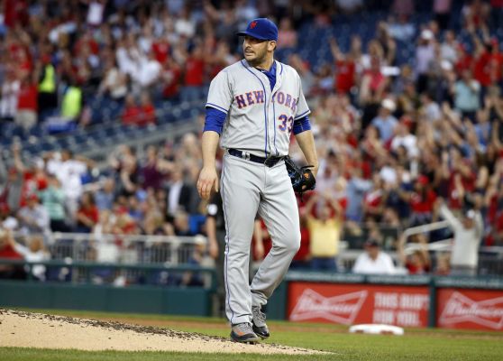 New York Mets starting pitcher Matt Harvey reacts