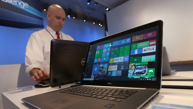 Dell laptop computer running Windows 10 is on display at the Microsoft Build conference in San Francisco | AP