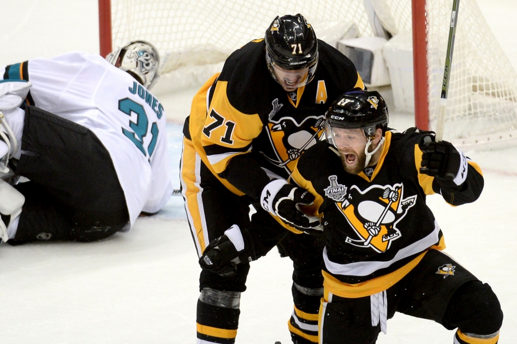 20160530mfpenssports03-1 The Penguins&#39 Bryan Rust is congratulated by Evgeni Malkin after scoring on Sharks goaltender Martin Jones in the first period. Rust left Game 1 after a head-high hit by San Jose Sharks winger Patrick Marleau in the third peri