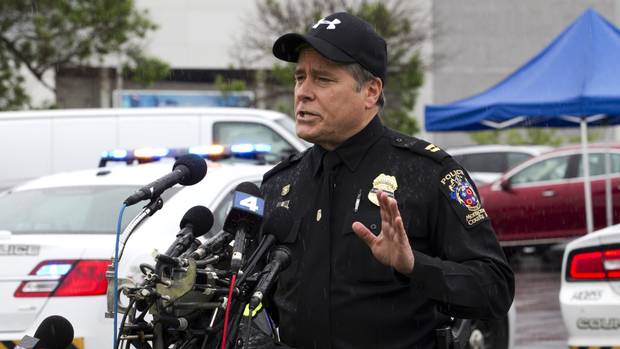 Montgomery County Police Captain Paul Starks speaks to the media