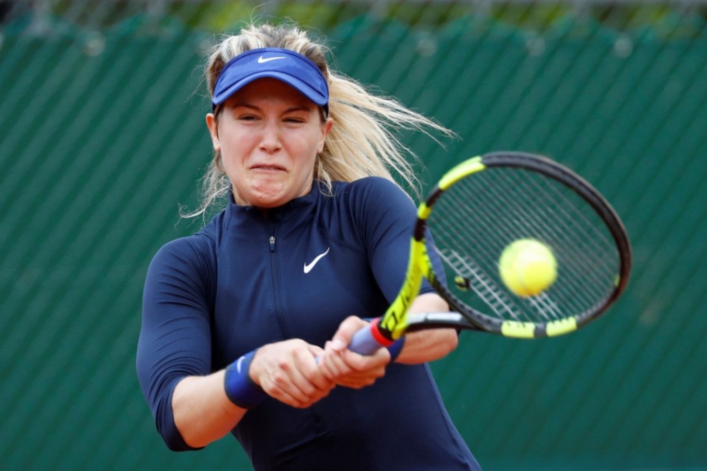 Canada's Eugenie Bouchard serves the ball to Germany's Laura Siegemund during their women's first round match at the Roland Garros 2016 French Tennis Open in Paris