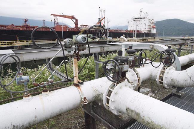 A ship receives its&#039 load of oil from the Kinder Morgan Trans Mountain Expansion Project's Westeridge loading dock in Burnaby B.C. in this