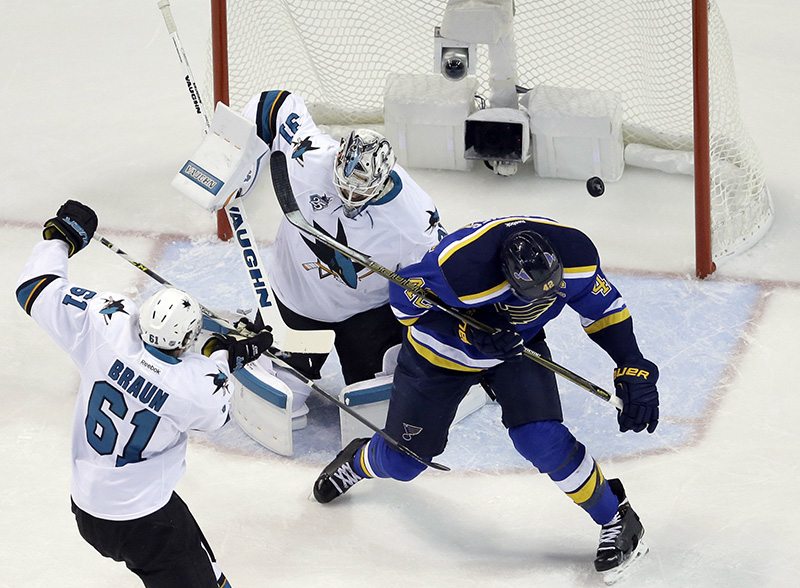 St. Louis Blues center David Backes right scores a goal against San Jose Sharks goalie Martin Jones during the first period in Game 1 of the NHL hockey Stanley Cup Western Conference finals Sunday