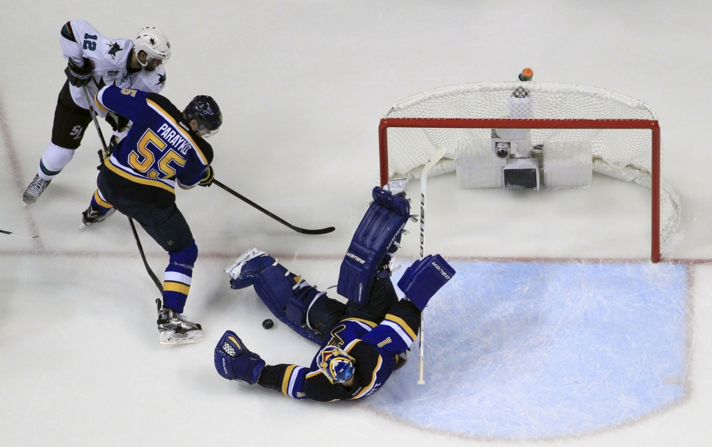 Blues goalie Brian Elliott made the save as Sharks center Patrick Marleau and Blues defenseman Colton Parayko battled for the puck during the third period in Game 1 of the Stanley Cup Western Conference finals on Sunday