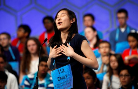 Emily Sun of Boston MA shows her relief after a correct spelling during a preliminary round at the 89th annual Scripps National Spelling Bee at National Harbor in Maryland U.S