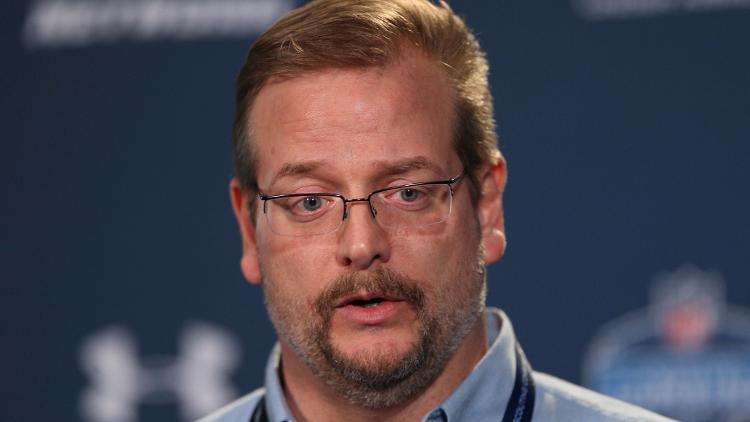 New York Jets general manager Mike Maccagnan speaks to the media during the 2015 NFL Combine at Lucas Oil Stadium