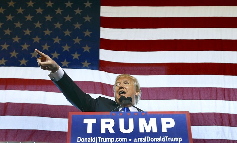 Republican presidential candidate Donald Trump speaks to guest gathered during a campaign event at the International Air Response facility