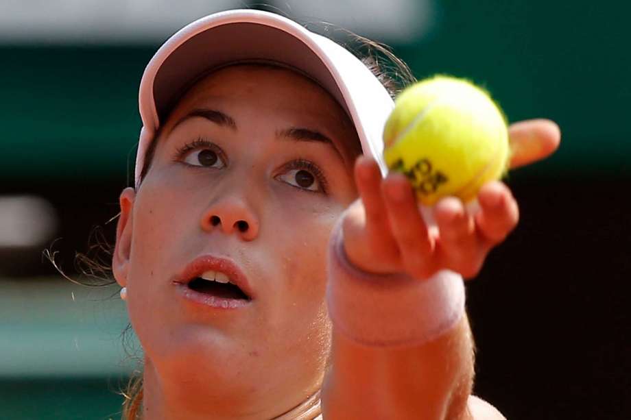 Spain's Garbine Muguruza serves the ball to Belgium's Yanina Wickmayer during their third round match of the French Open tennis tournament at the Roland Garros stadium Friday