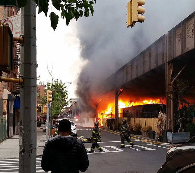 Fire under Metro-North tracks in Harlem