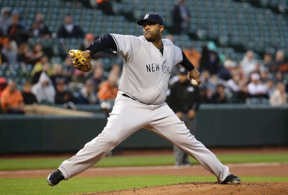 New York Yankees starting pitcher CC Sabathia throws