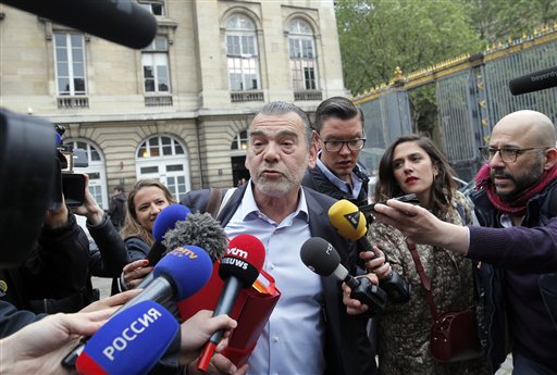 Frank Berton lawyer of Paris attacks suspect Salah Abdeslam addresses the media as he arrives at the Paris courthouse Friday