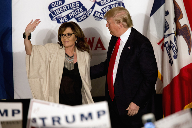 Republican presidential candidate Donald Trump is joined on stage by former Republican vice presidential candidate