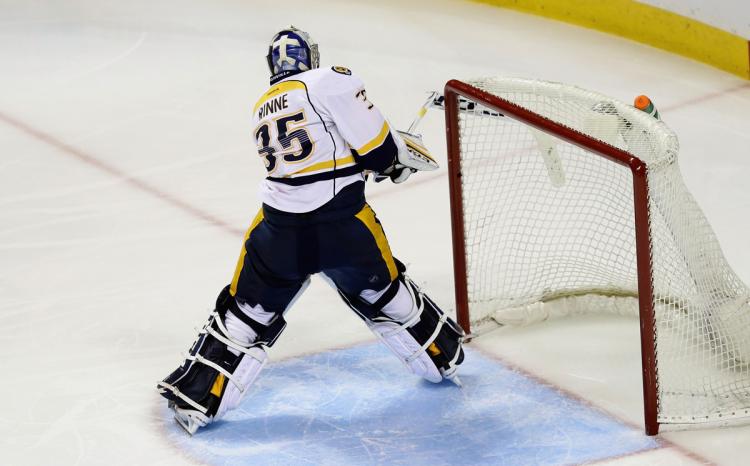 Pekka Rinne smashes his stick after giving up a fifth goal in a Game 7 loss to the Sharks