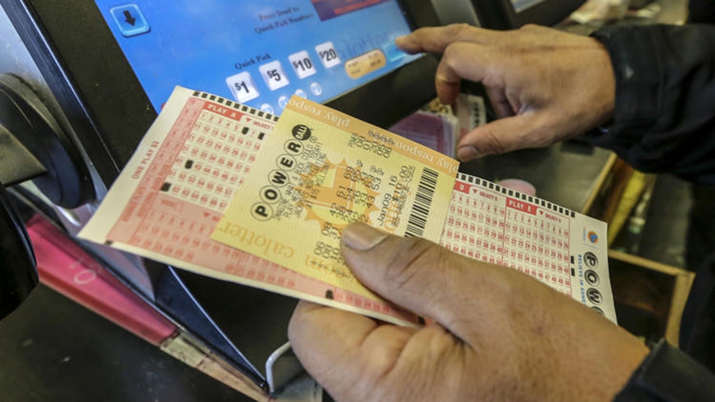 People buying Powerball their lottery tickets at Bluebird Liquor store in Hawthorne on Jan. 8 2016