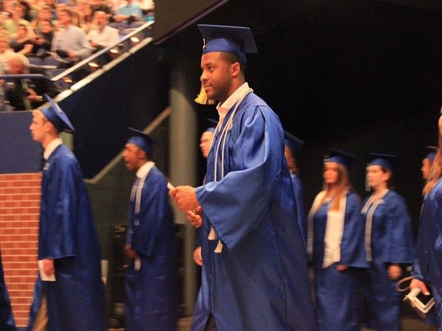 Former Kentucky star WR Randall Cobb's graduation comes with Aaron Rodgers in attendance