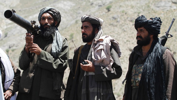 Members of a breakaway faction of the Taliban fighters guard during a patrol in Shindand district of Herat province Afghanistan