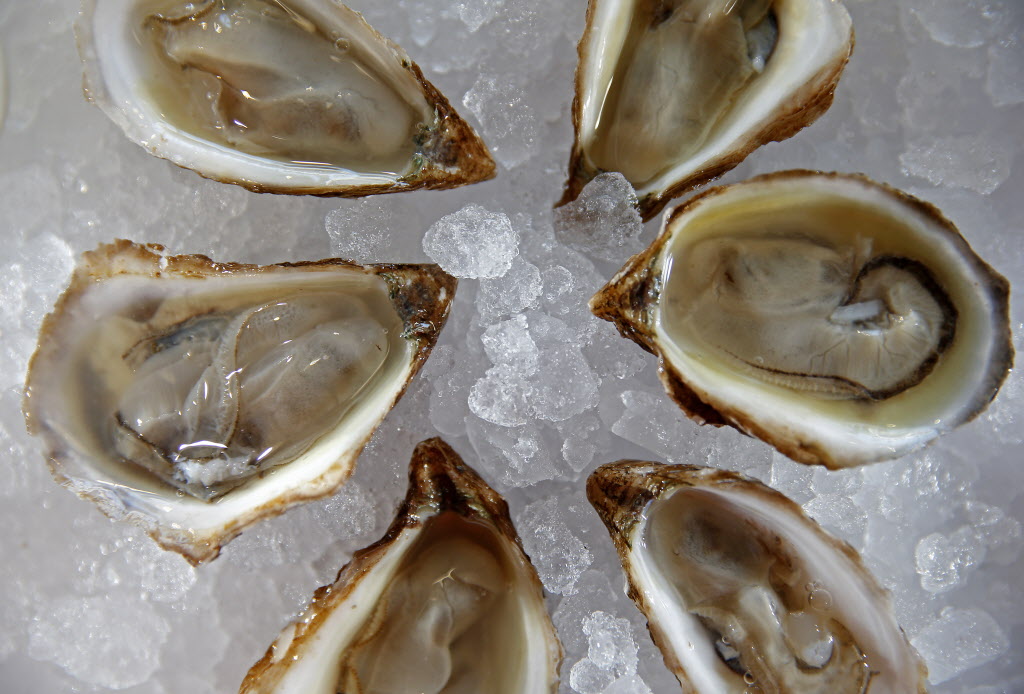 Pink Moon oysters at Rex's Seafood at the new farmers market shed No. 2 in Dallas Saturday Feb. 13 2016