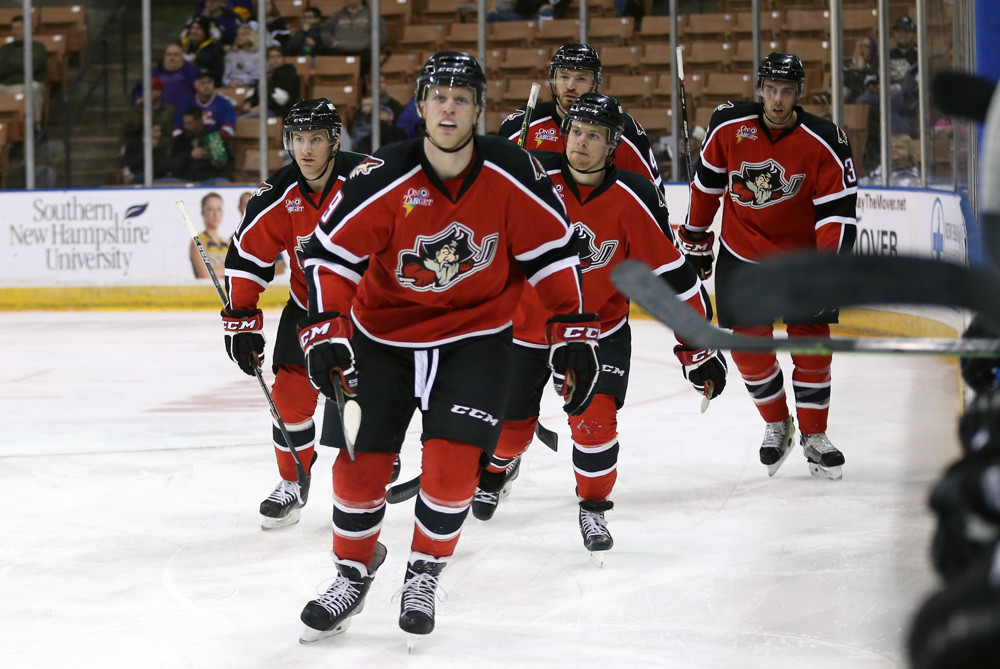 Portland Pirates Right Wing Henrik Samuelsson leads his teammates back to the bench after tying the game 1-1. The Manchester Monarchs defeated the Portland Pirates 5-2 in Game 1 of the Eastern Conference Quarterfinals of the 2015 AHL