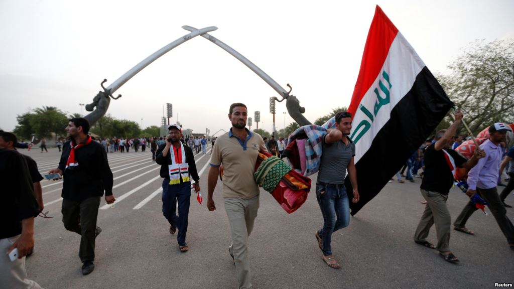 Followers of Iraqi Shi'ite cleric Moqtada al Sadr leave the heavily secured Green Zone in Baghdad Iraq