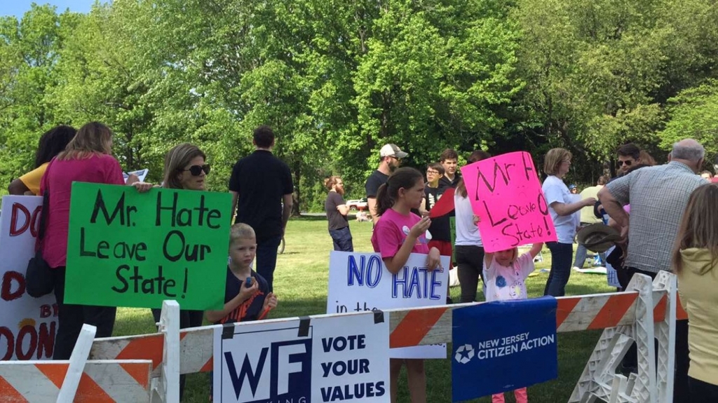 Protesters await Donald Trump in Lawrenceville