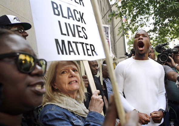 Protesters gathered outside of a courthouse in Baltimore after Officer Edward Nero was acquittted