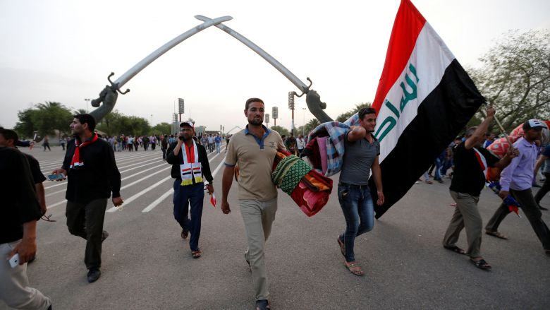 Followers of Iraqi Shiite cleric Moqtada Al Sadr leave the Green Zone in Baghdad,May 1 after issuing a list of demands for government reform. REUTERS  Thaier Al-Sudani