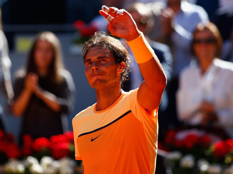 Rafael Nadal celebrates after victory over Kuznetsov