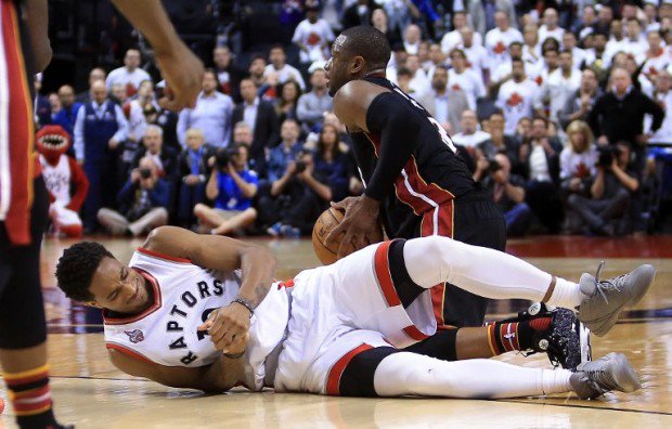 DeMar De Rozan #10 of the Toronto Raptors injures his hand late in the second half of Game One of the Eastern Conference Semifinals against the Miami Heat during the 2016 NBA Playoffs at the Air Canada Centre