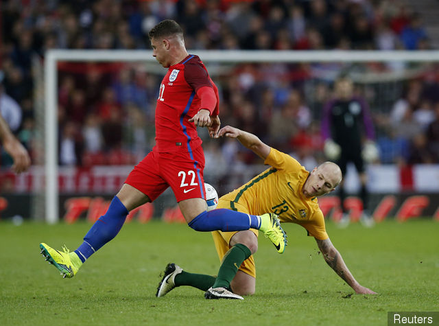 England's Ross Barkley in action with Australia's Aaron Mooy