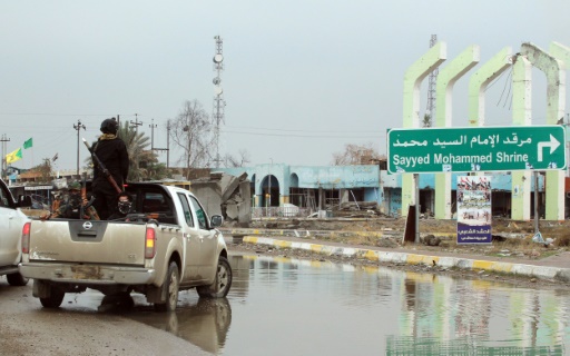 AFP  File  Sabah Arar
Pro Iraqi government forces ride in the back of a truck in Balad in Iraq's Saladeddin province