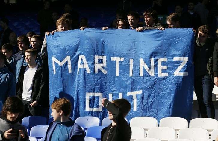 Britain Football Soccer- Everton v AFC Bournemouth- Barclays Premier League- Goodison Park- 30/4/16 Everton fans with a banner regarding Everton manager Roberto Martinez Action Images via Reuters  Jason Cairnduff Livepic