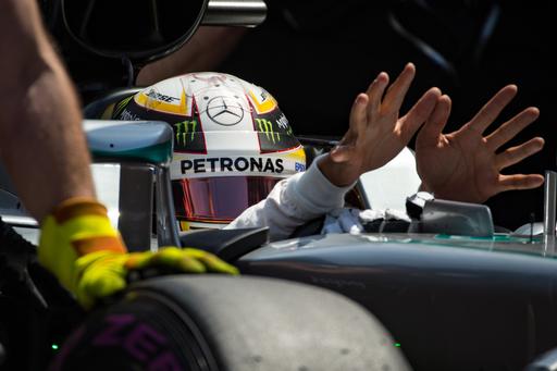 Mercedes driver Lewis Hamilton of Britain gestures in the pit lane during the qualification at the Monaco racetrack in Monaco Monaco Saturday