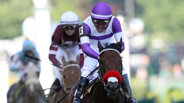 Nyquist and Mario Gutierrez winning the 142nd running of the Kentucky Derby at Churchill Downs