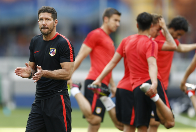 Atletico's coach Diego Simeone leads a training session at the San Siro stadium in Milan Italy Friday