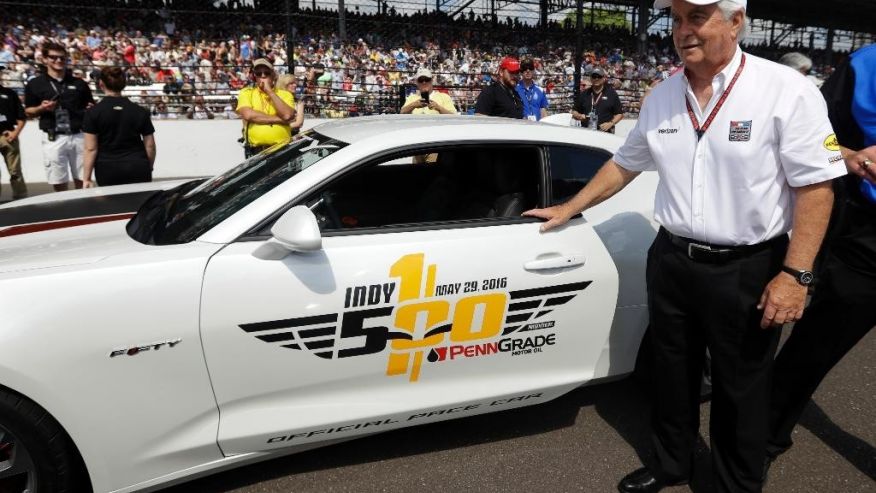 Pace car driver and car owner Roger Penske walks to the pace car before the 100th running of the Indianapolis 500 auto race at Indianapolis Motor Speedway in Indianapolis Sunday