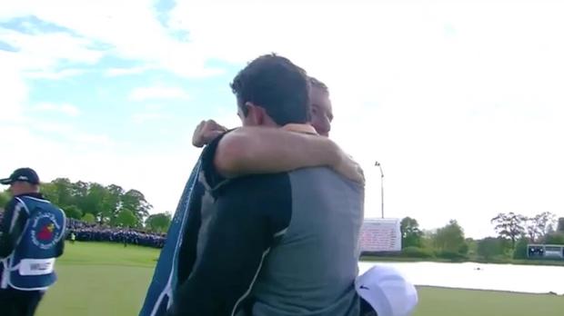 Rory Mc Ilroy embraces his caddie J.P. Fitzgerald.                     @EuropeanTour