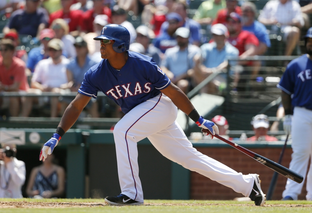 Texas Rangers&#039 Adrian Beltre follows through on a single to center that scored Ian Desmond in the sixth inning of a baseball game against the Chicago White Sox on Wednesday