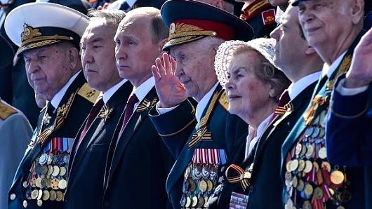 Russian President Vladimir Putin attends the Victory Day military parade