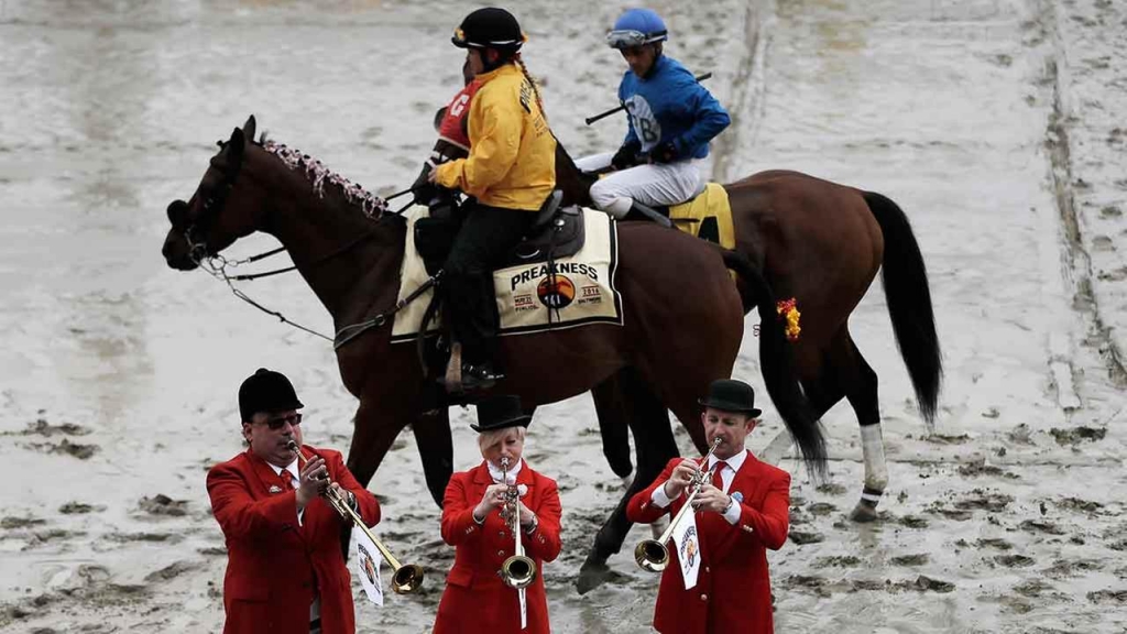 The All Star Buglers perform before the first race of the day ahead of the 141st Preakness Stakes horse race