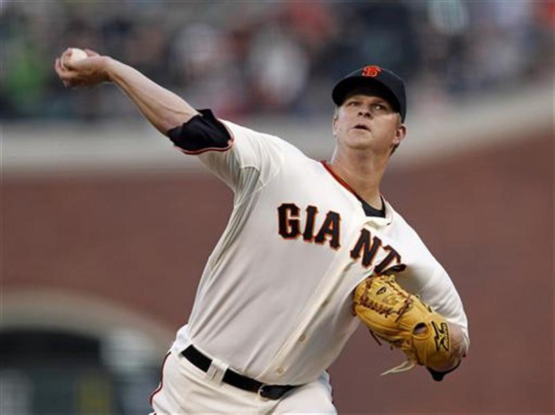 San Francisco Giants&#39 pitcher Matt Cain releases the ball during the first inning of their MLB National League baseball game against the Phi