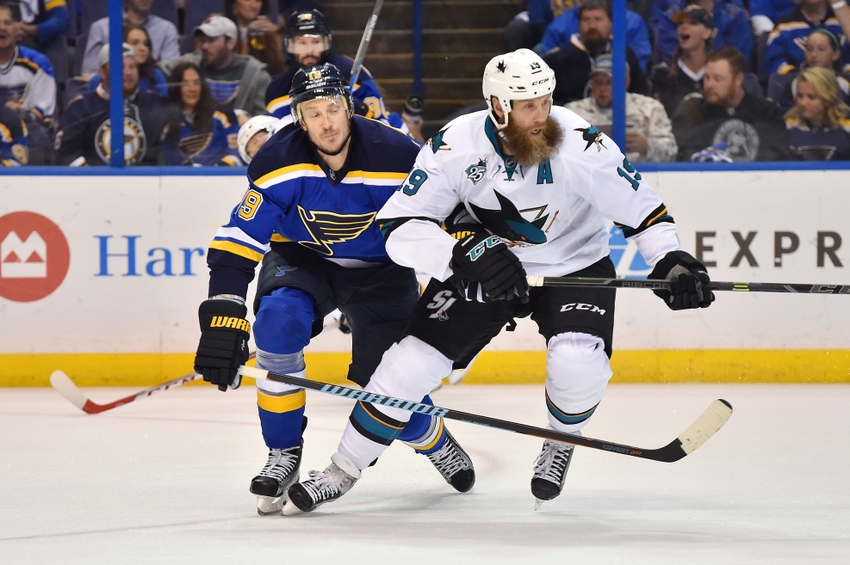 St. Louis MO USA San Jose Sharks center Joe Thornton and St. Louis Blues defenseman Jay Bouwmeester battle for position on the ice during the second period in game one of the Western Conference Final of the 2016 Stanley Cup Play