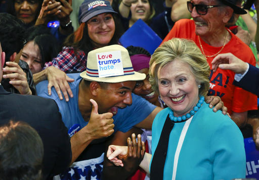 Democratic presidential candidate Hillary Clinton greets supporters as she campaigns at East Los Angeles College in Los Angeles Thursday