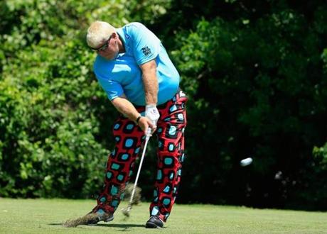 THE WOODLANDS TX- MAY 06 John Daly hits his tee shot on the third hole during the first round of the Insperity Championship at The Woodlands Country Club