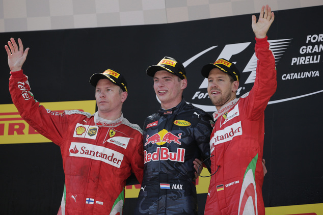 Race winner Red Bull driver Max Verstappen of the Netherlands centre poses with 2nd placed Ferrari driver Kimi Raikkonen of Finland left and 3rd placed Fe