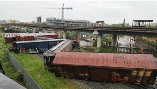 Several cars remain overturned after a CSX freight train derailed in Washington on Sunday