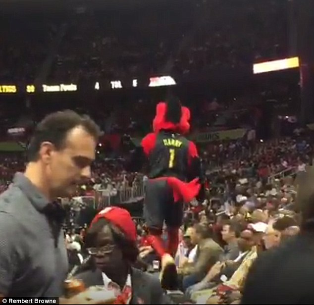 Short cut Harry the Hawk tried to cross walkways by balancing on a railing during Tuesday night's game and is started out alright