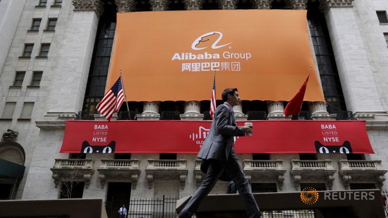 Signage for Alibaba Group Holding Ltd. covers the front facade of the New York Stock Exchange