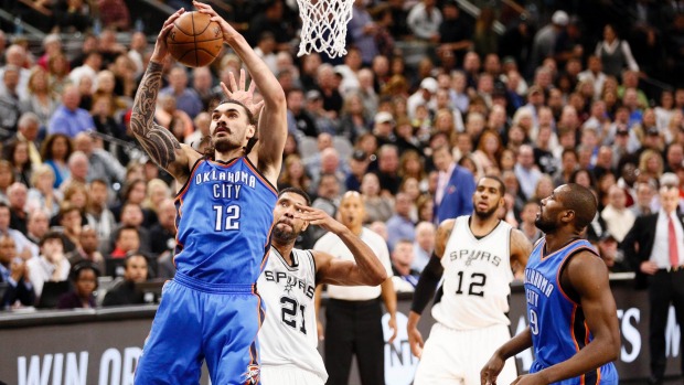 Steven Adams snares a rebound in game two of OKC's playoff series with the Spurs